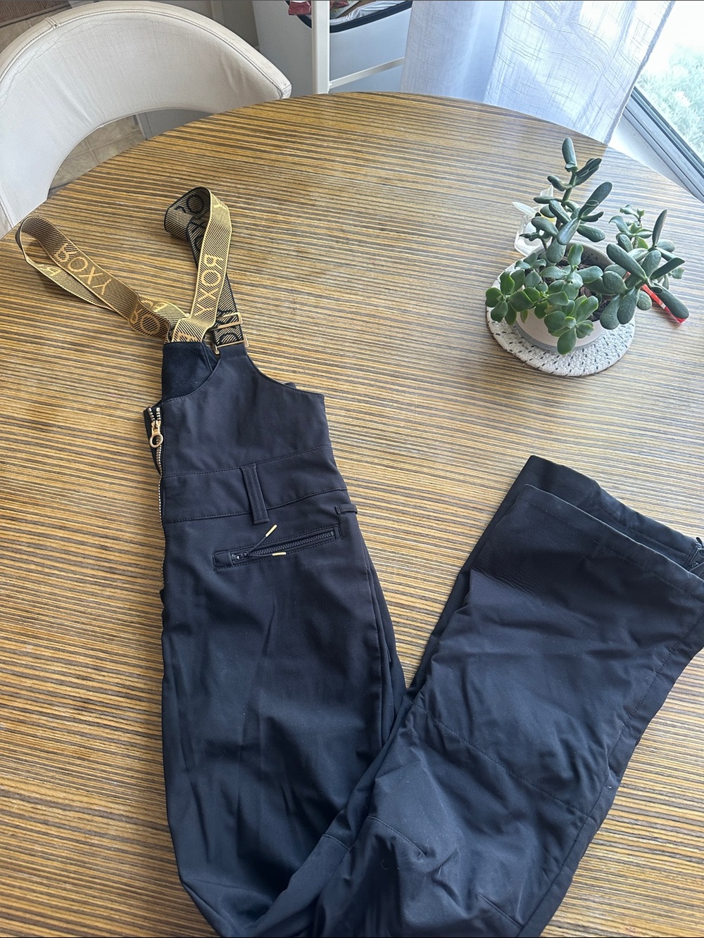 Black Women's Ski/snowboard overalls/bib with Branded Gold Straps